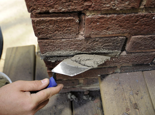 Cómo volver a colocar una pared de ladrillos