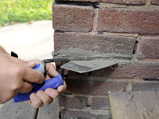 Cómo volver a colocar una pared de ladrillos