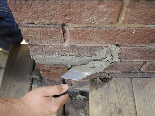 Cómo volver a colocar una pared de ladrillos